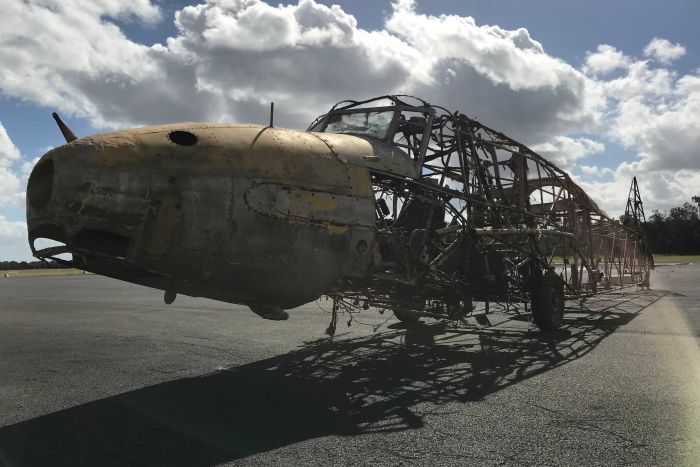 The WWII Avro Anson on the tarmac outside the Evans Head Memorial Aerodrome hanger.